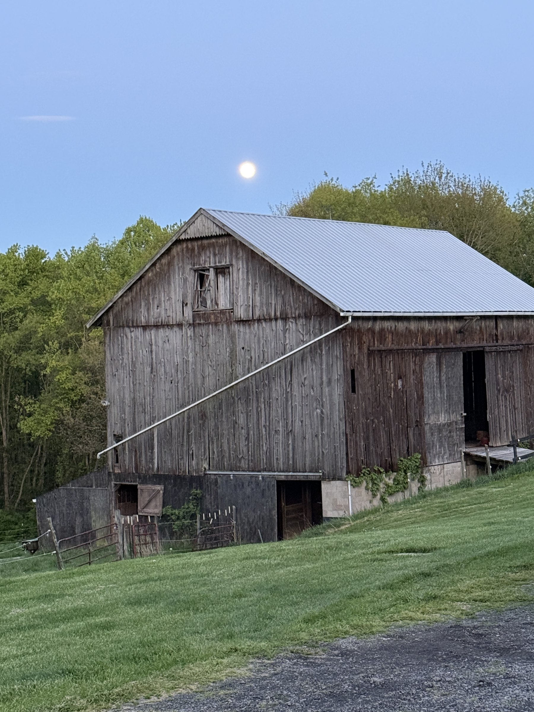 The Boujee Barn Pet Resort barn at dusk in Georgetown, PA