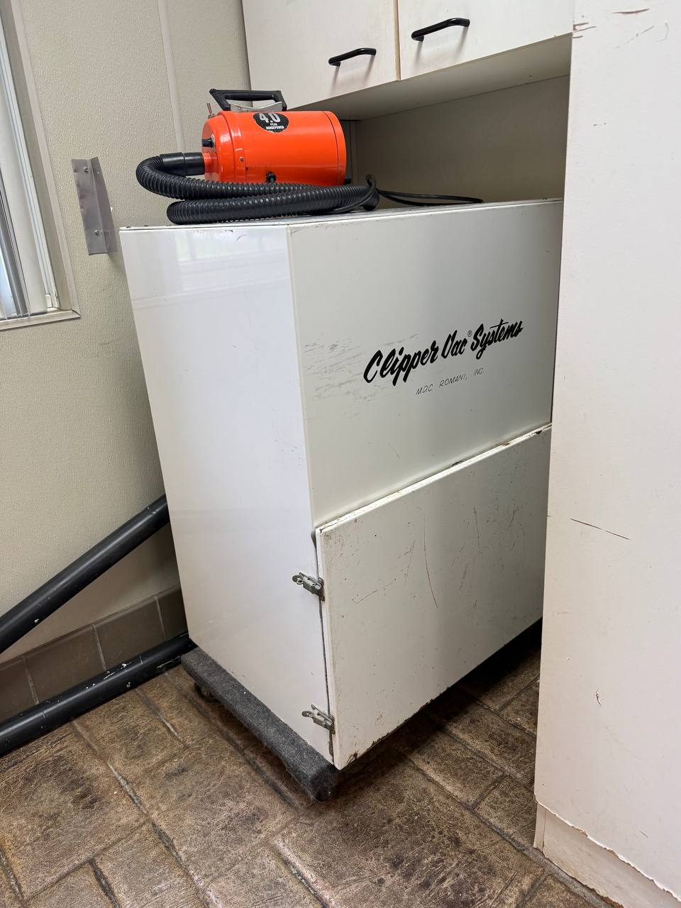 Romani Clipper Vac System in the Boujee Barn grooming room